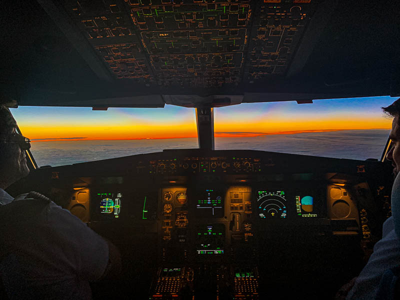 sunset, seen through cockpit windows