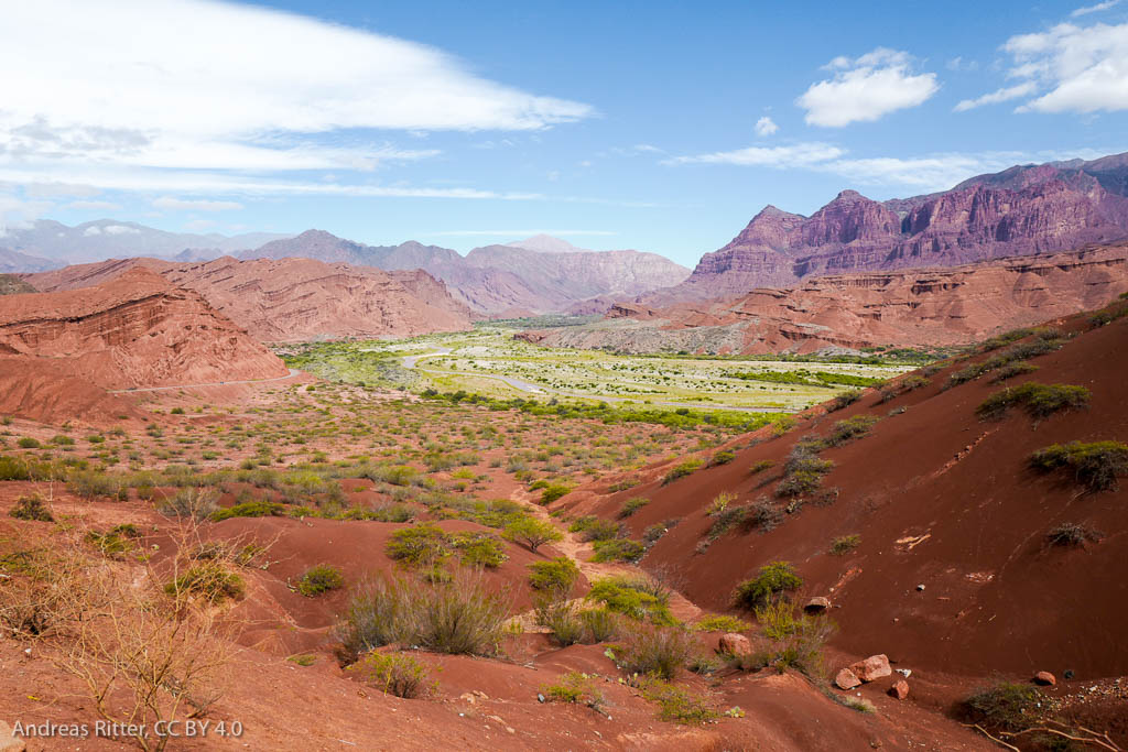 green valley, red mountains